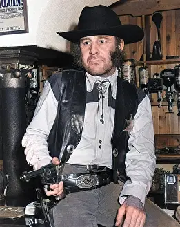 Bootlace: Man in cowboy outfit, Hayle, Cornwall