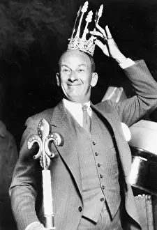 Self Satisfaction: Man with a crown a scepter looking proud