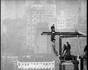 Plank: Man Dangling By His Feet From A Plank Suspended