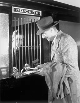 Passbook: Man At Deposit Window At Bank