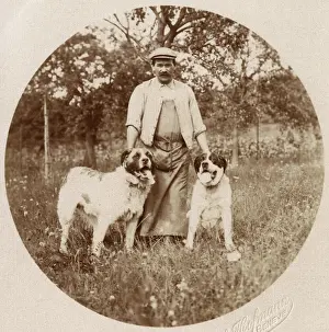 Hofmann: Man with two dogs in a field, Switzerland