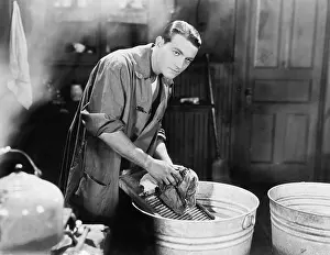 Damp: Man doing laundry
