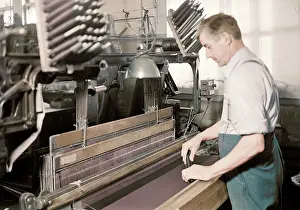 Holyoke: Man doubling and twisting silk, 1936