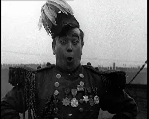 Mimicking: A Man Dressed As An Admiral Mimicking Kaiser