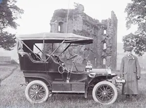 Crickhowell: Man with early car, Crickhowell Castle, Powys, Mid Wales