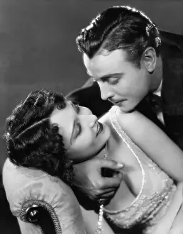 Coquettish: Man embracing a woman