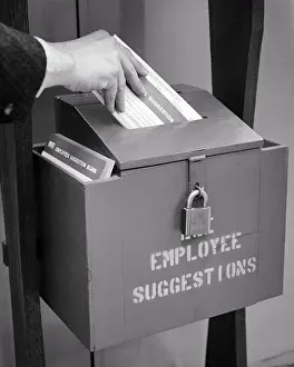 Padlock: Man Employee Hand Dropping Message into Company