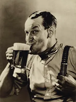 Braces: Man enjoying a pint of beer