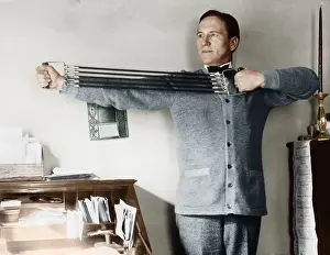 Workout: Man exercising in his office