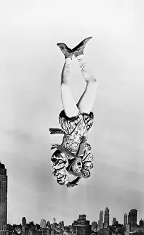 Midair: Man falling upside down from the sky