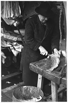 Fillets: A MAN FILLETING FISH