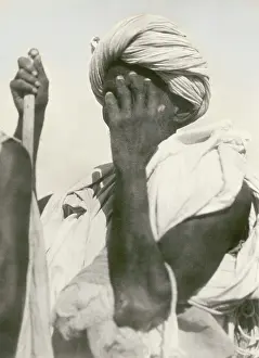 Ethnological: A man at the fish market in Suakin does not want