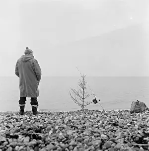 Propped: Man Fishing