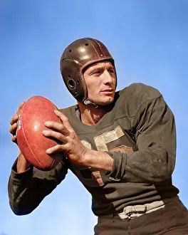 Toss: Man Football Quarterback About To