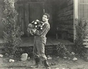 Overworked: Man gathering firewood