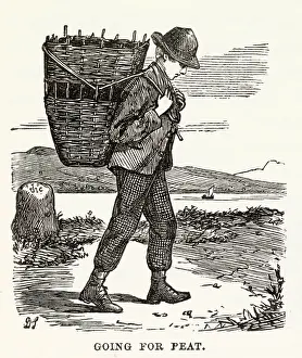 Skye: Man gathering peat in Island of Skye