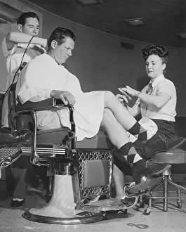 Manicured: Man getting his hair cut and nails manicured