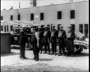 Wardens: A Man Greeting Air Raid Wardens