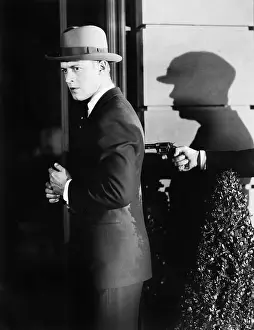 Mugging: Man with a gun in his back