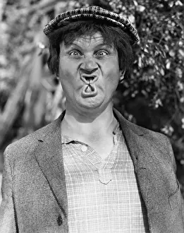 Absurdity: Man gurning and making a funny face
