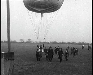 Bouncing: A Man Is Having A Go at Balloon Jumping -