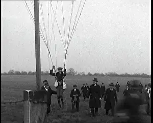 Bouncing: A Man Is Having A Go at Balloon Jumping -