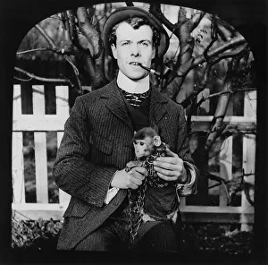 Bruce Castle Museum: Man holding a Monkey