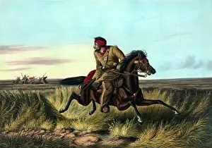 Pursuit: A man on a horse in the middle of prairie with