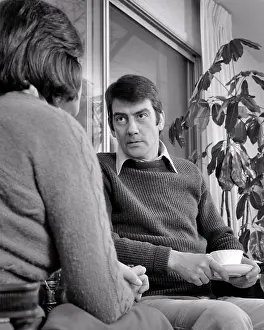 Sexist: Man Husband with Serious Stern Facial Expression Sitting