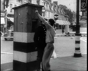 Informing: A Man Informing an Air Raid Warden of Something