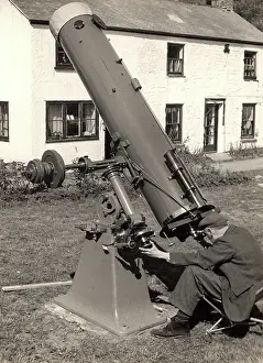 Telescopic: Man with large telescope