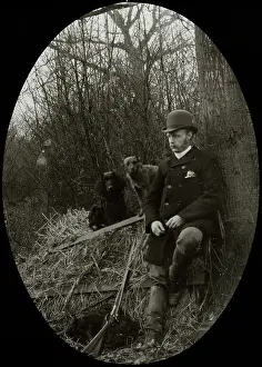 Leaned: Man leaning against a tree with rifle