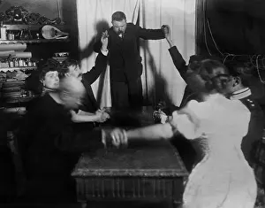 Darkened: Man levitates during a seance at Baron von