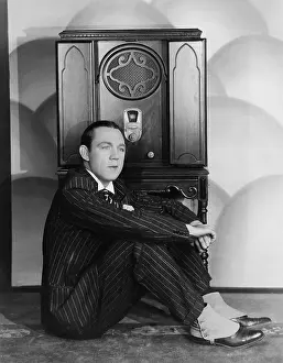 Spats: Man listening to the radio