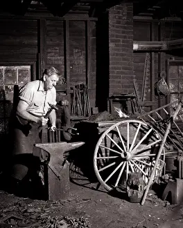 Crs001: Man Local Village Blacksmith Working As Farrier Shaping a
