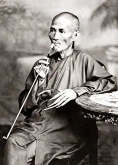 Fingernails: Man with long fingernails and pipe China, circa 1880s