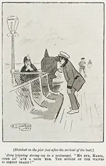 Mutoscope: Man looking through a mutoscope on the pier
