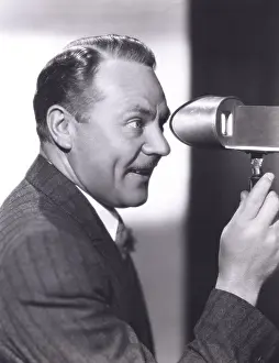 Viewfinder: Man looking through a viewfinder