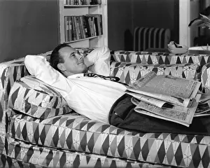 Sprawled: Man Lying On A Couch