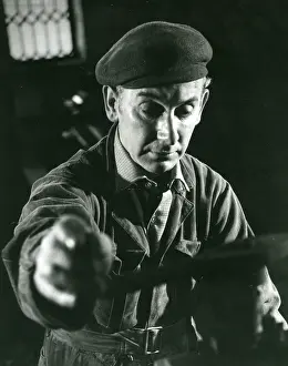 Llanberis: Man in machine shop, Dinorwig Slate Quarry, North Wales