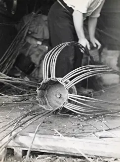 Withies: Man making lobster pot at Beesands, Start Bay, Devon