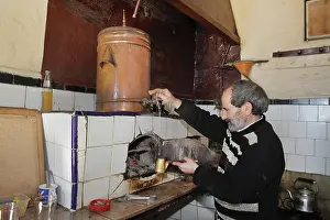 Samovar: Man making mint tea, Tetouan, Morocco