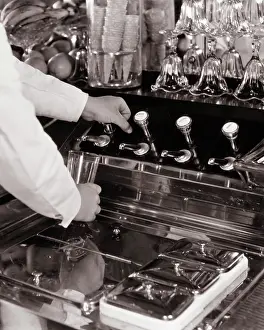 Sundaes: Man Male Hands Working Behind Counter