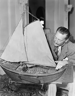 Miniatures: Man with model ship
