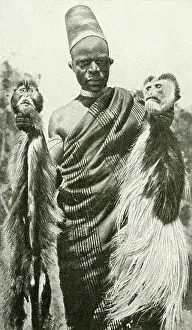 Cercopithecus: Man with two monkey heads, East Africa