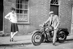 Girlfriend: Man on a motorcycle with girlfriend