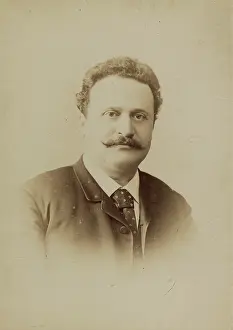 Neckties: Man with mustache and tie 1890. Photograph
