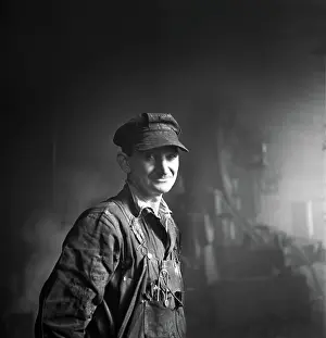Roundhouse: man - occupations - welder - railroad