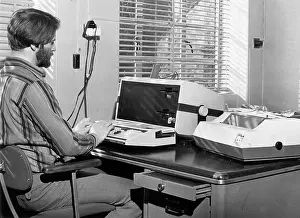 Processor: Man in an office with an Exidy Sorcerer computer
