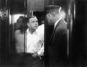 Startle: Man opening his door and looking shocked